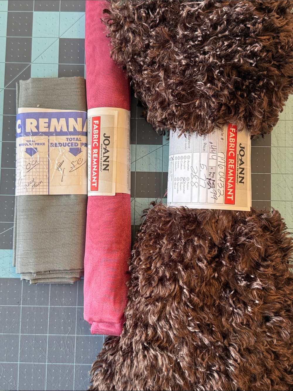 J.O.A.N Fabric Remnant Trio in Brown Fur, Red Cotton, and Olive. Fabric scraps